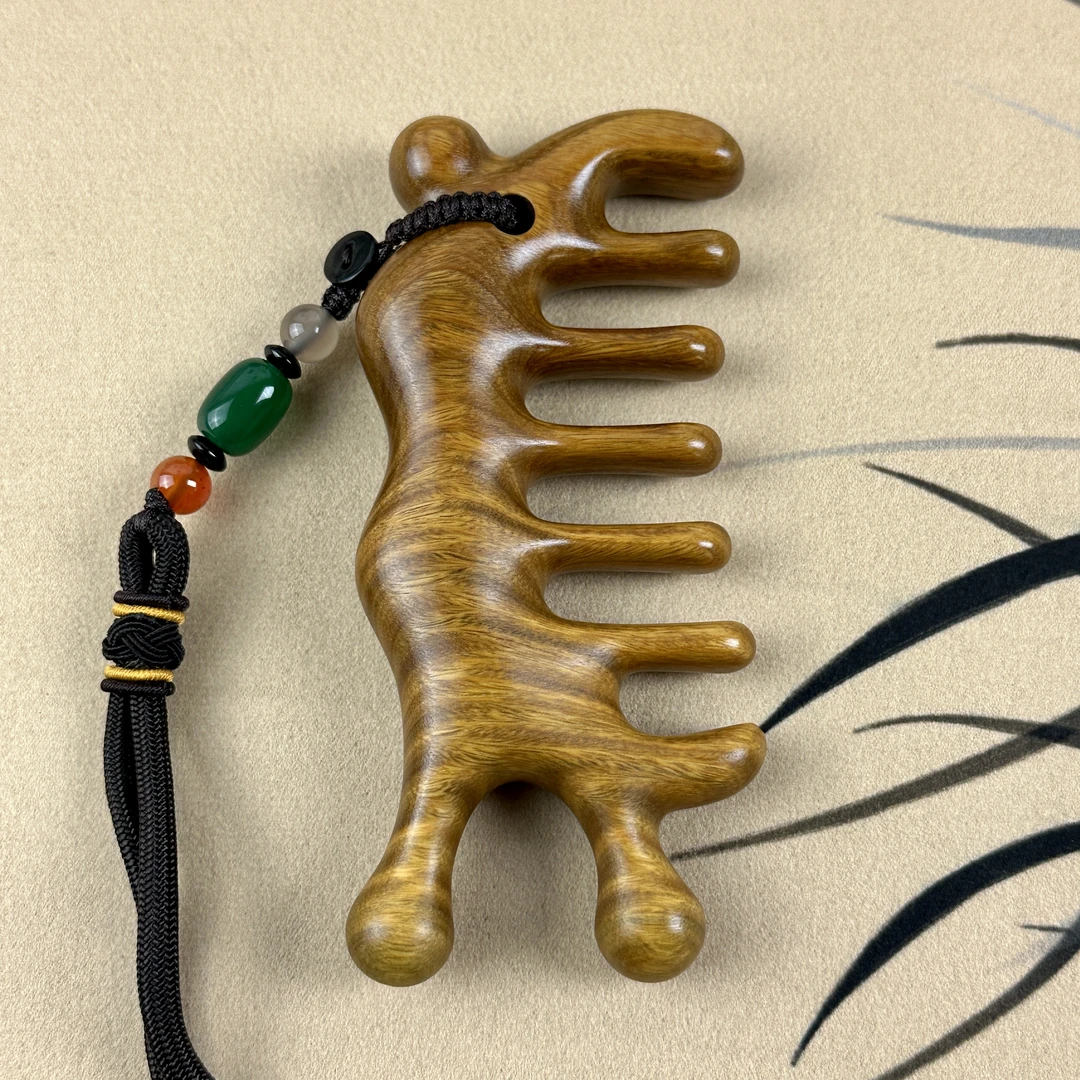 巴拉圭绿檀大蜗牛按摩梳  头部面部全身按摩