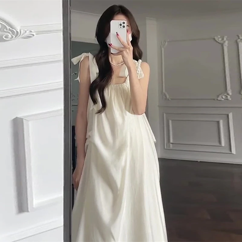 7649茶歇吊带连衣裙子女2024年夏季新款法式温柔风无袖气质长裙