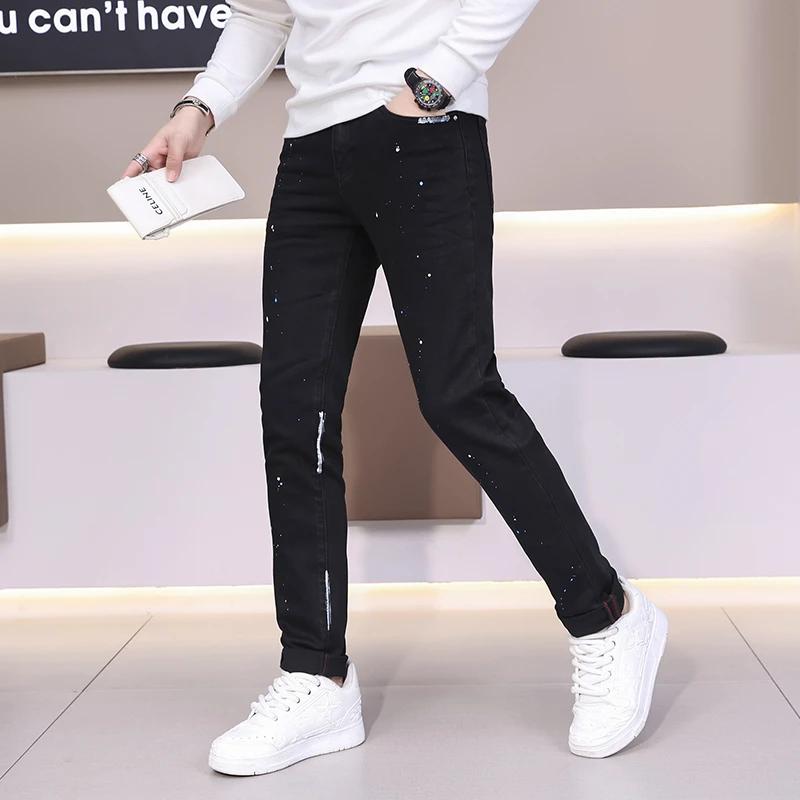 春秋男士牛仔裤黑纯黑色手工泼漆时尚百搭修身小脚牛仔裤