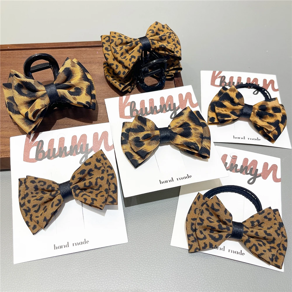 A438儿童发饰韩版豹纹蝴蝶结发夹女童扎发绳小女孩后脑勺抓夹头饰