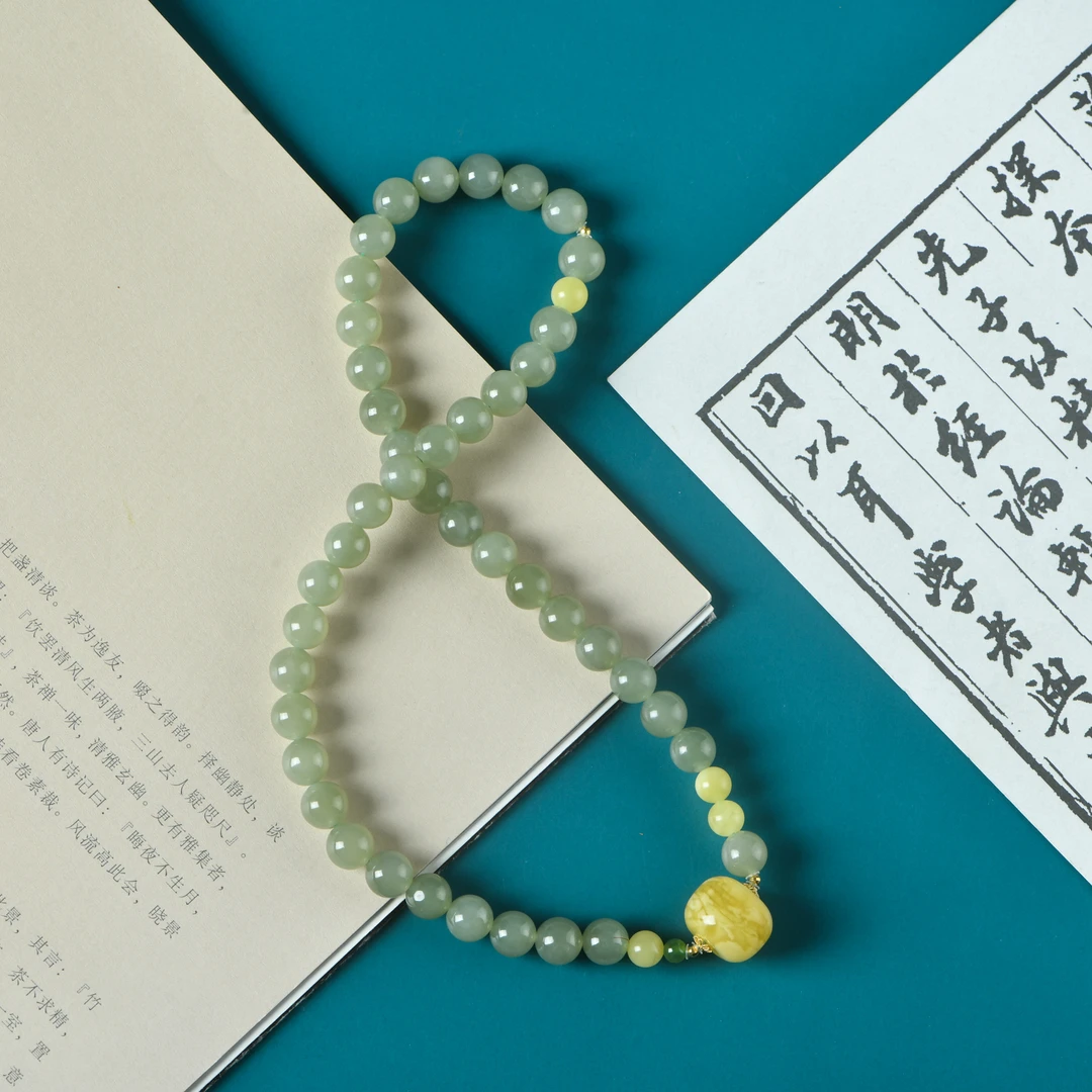 和田玉晴水料0.8双圈手链鼓珠蜜蜡款