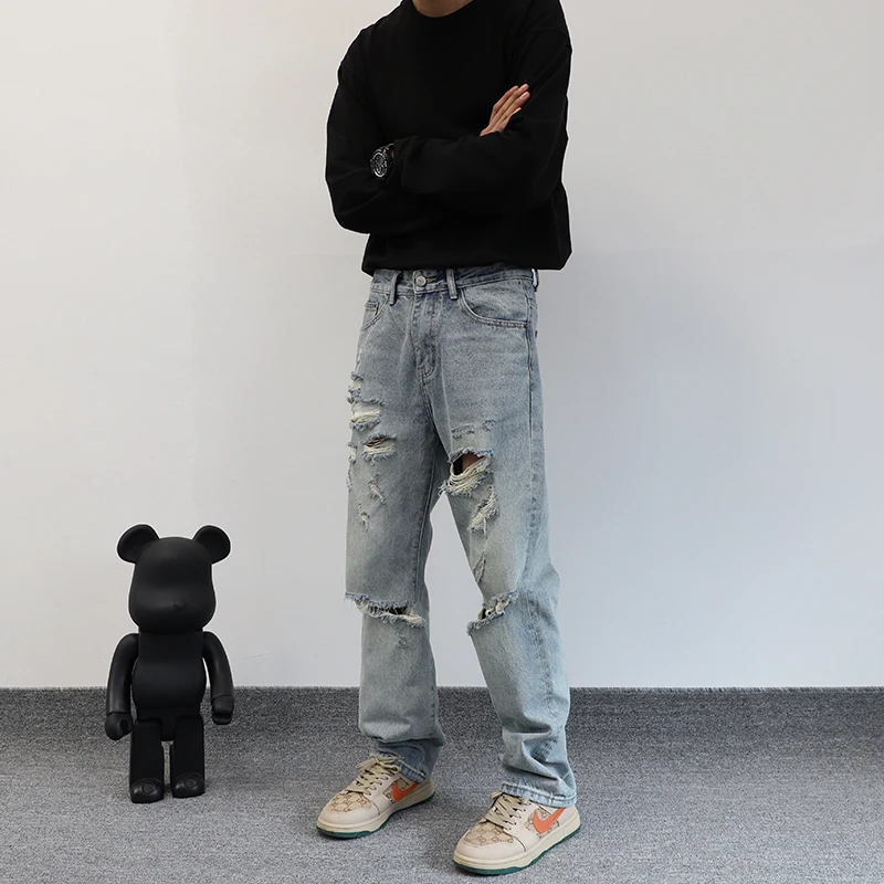春秋美式高街乞丐ins破洞牛仔裤男士宽松直筒痞帅大码休闲长裤男