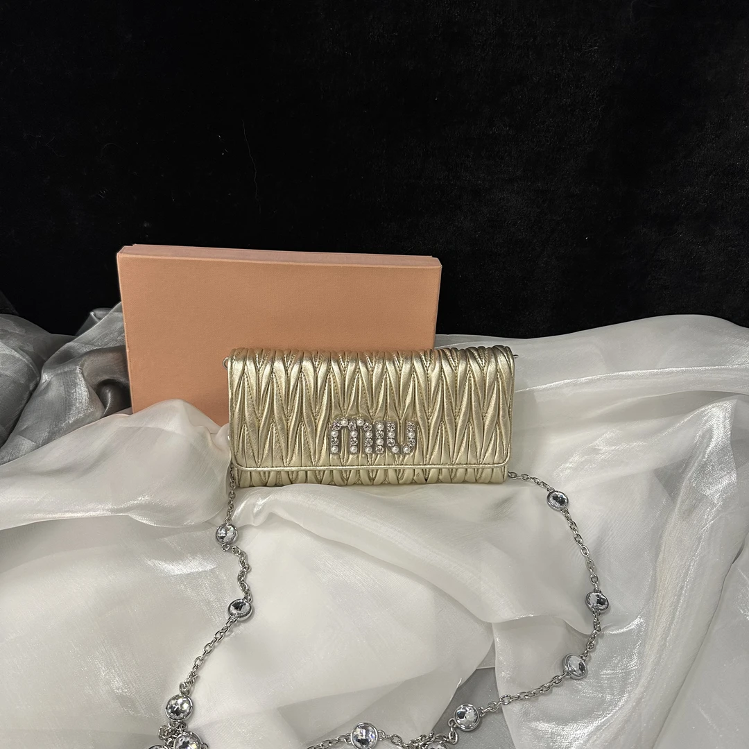 95新 MIU MIU/缪缪 miumiu 手拿包斜挎包