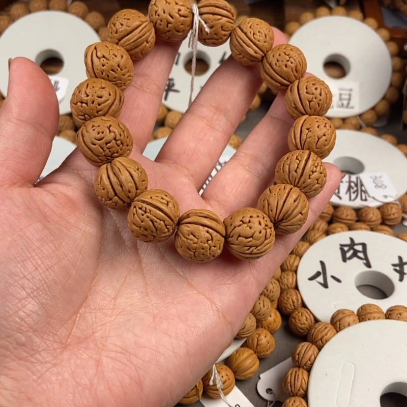 【闪购商品】桃核手串金鱼肚18