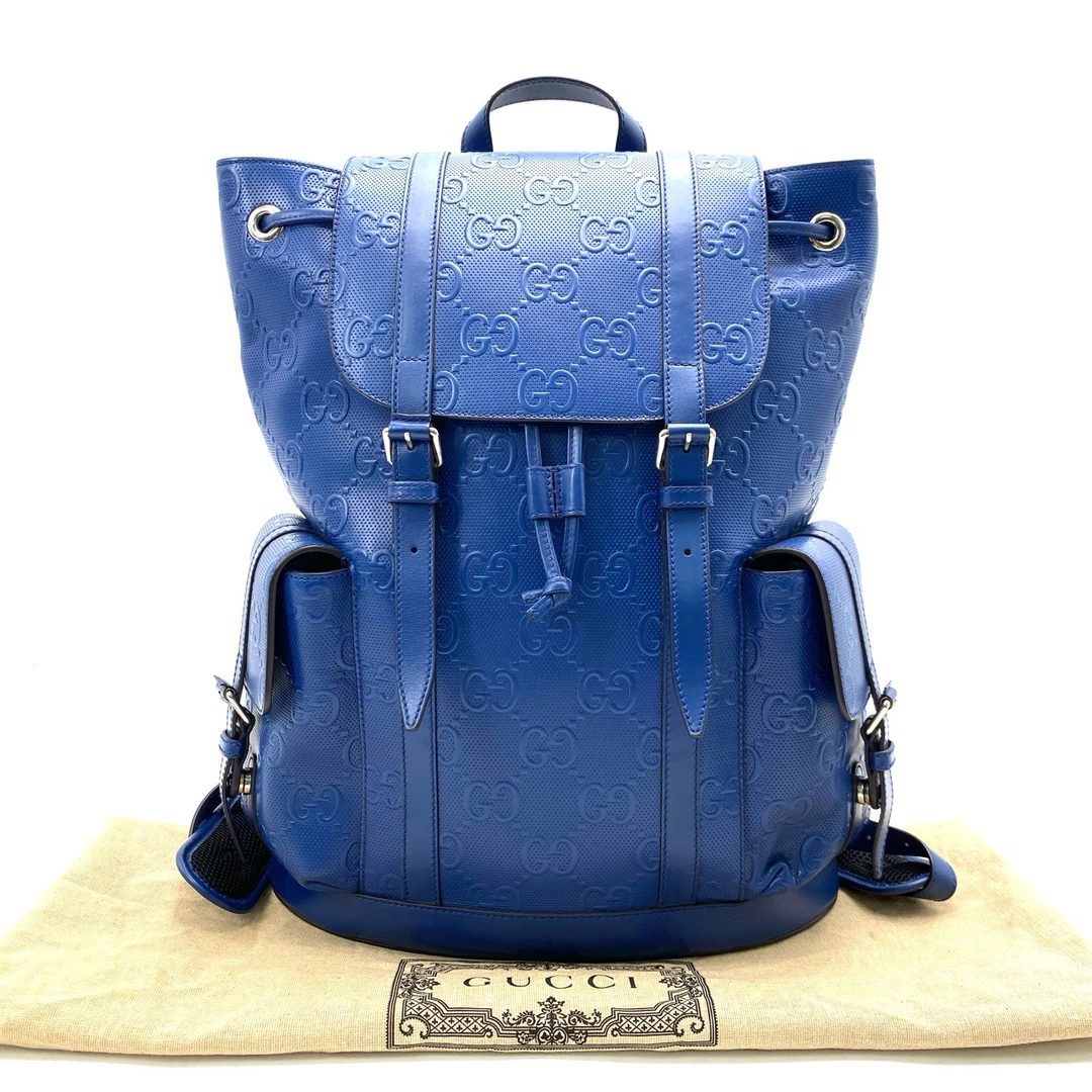 95新 GUCCI/古驰 98新古驰蓝色全皮浮雕双肩包 尺寸34/43