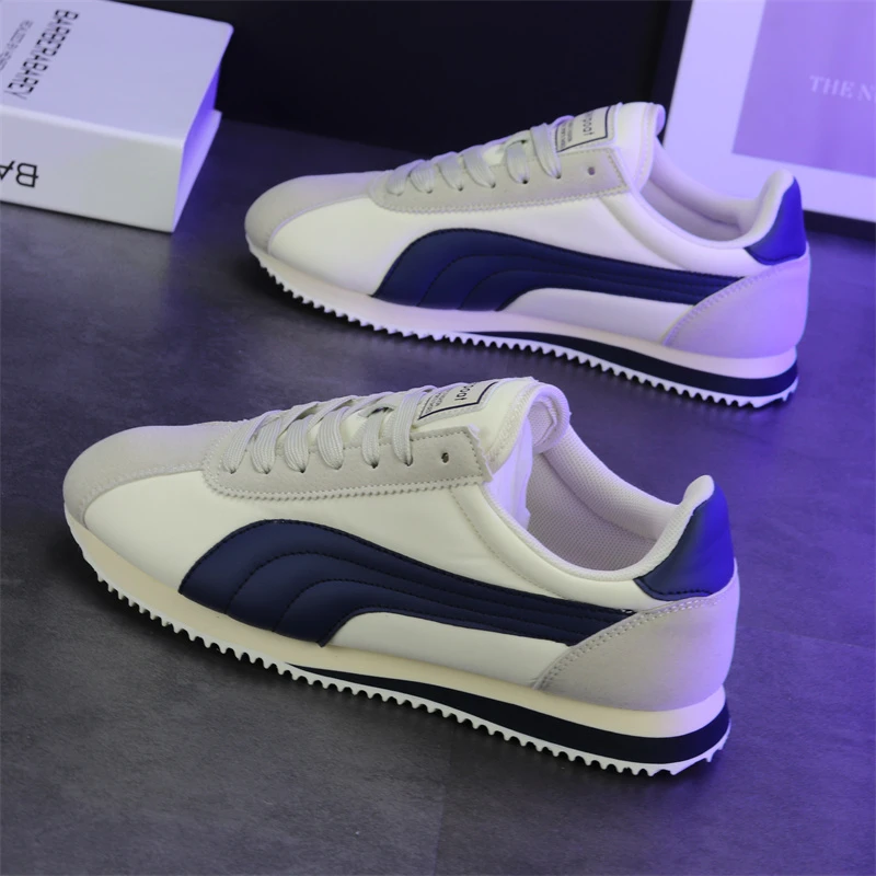 人本复古阿甘鞋男女学生轻便休闲鞋时尚经典透气布面运动鞋情侣款