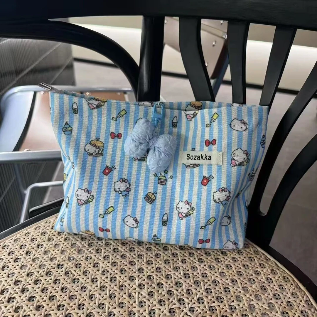 新款小猫冰淇淋印花收纳包大容量开学百搭帆布包高配2024手拿包