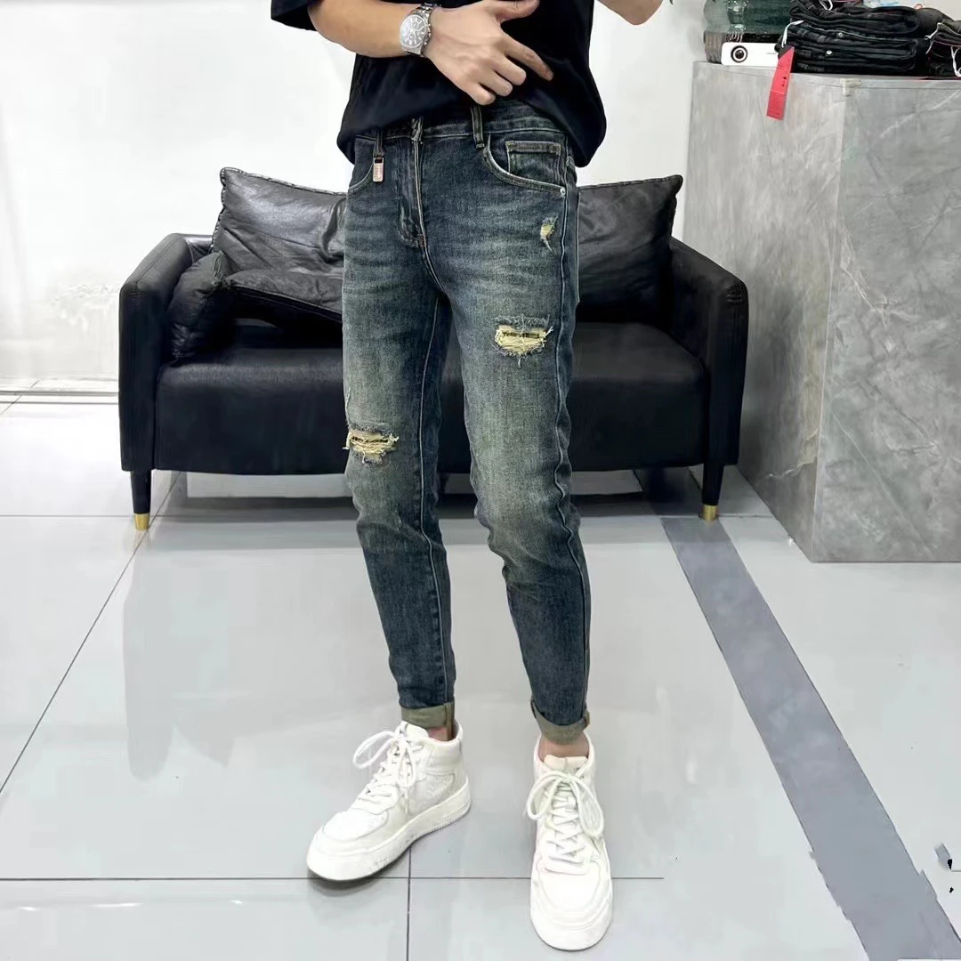 潮流破洞牛仔裤男修身小脚裤复古弹力九分裤