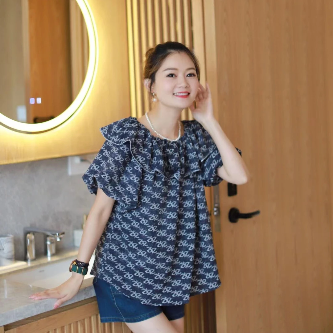 [哲思凡女装]蓝色印花荷叶翻领短袖衬衫小衫碎花甜美娃娃衫时尚