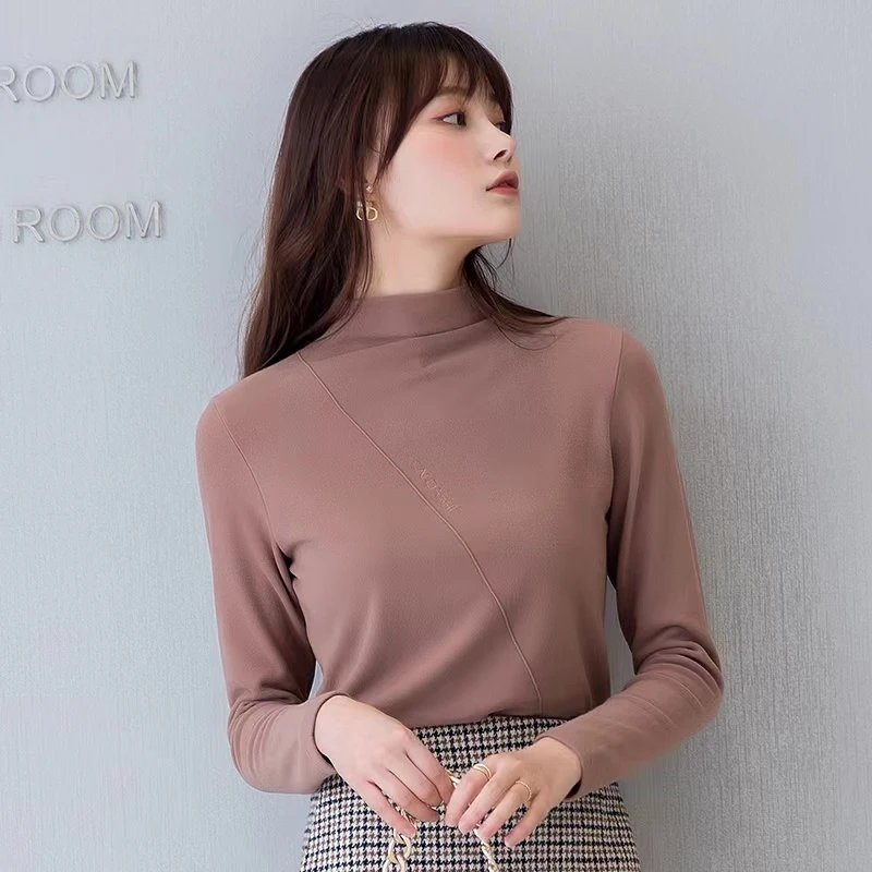 CM2108女士备氧外穿斜条上衣打底衫