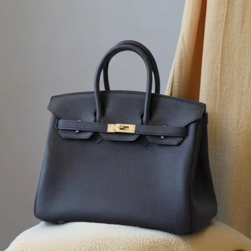 【康妮甄选】秋冬简约潮流轻奢百搭时尚气质女斜跨包XKY-6802-黑色