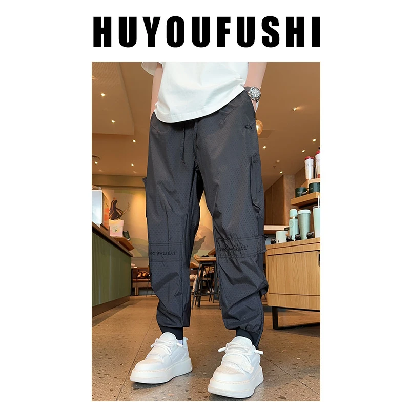 LKT.NINE夏季空调裤男薄款裤子激光打孔速干休闲裤痞帅百搭小脚裤