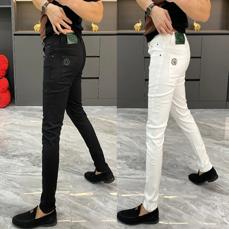 春秋季白色牛仔裤男士欧货时尚简约气质百搭小脚裤痞帅休闲直筒裤