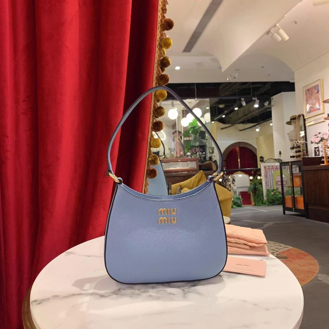 95新 MIU MIU/缪缪 GGS丨蓝色金扣hobo腋下包 93195805