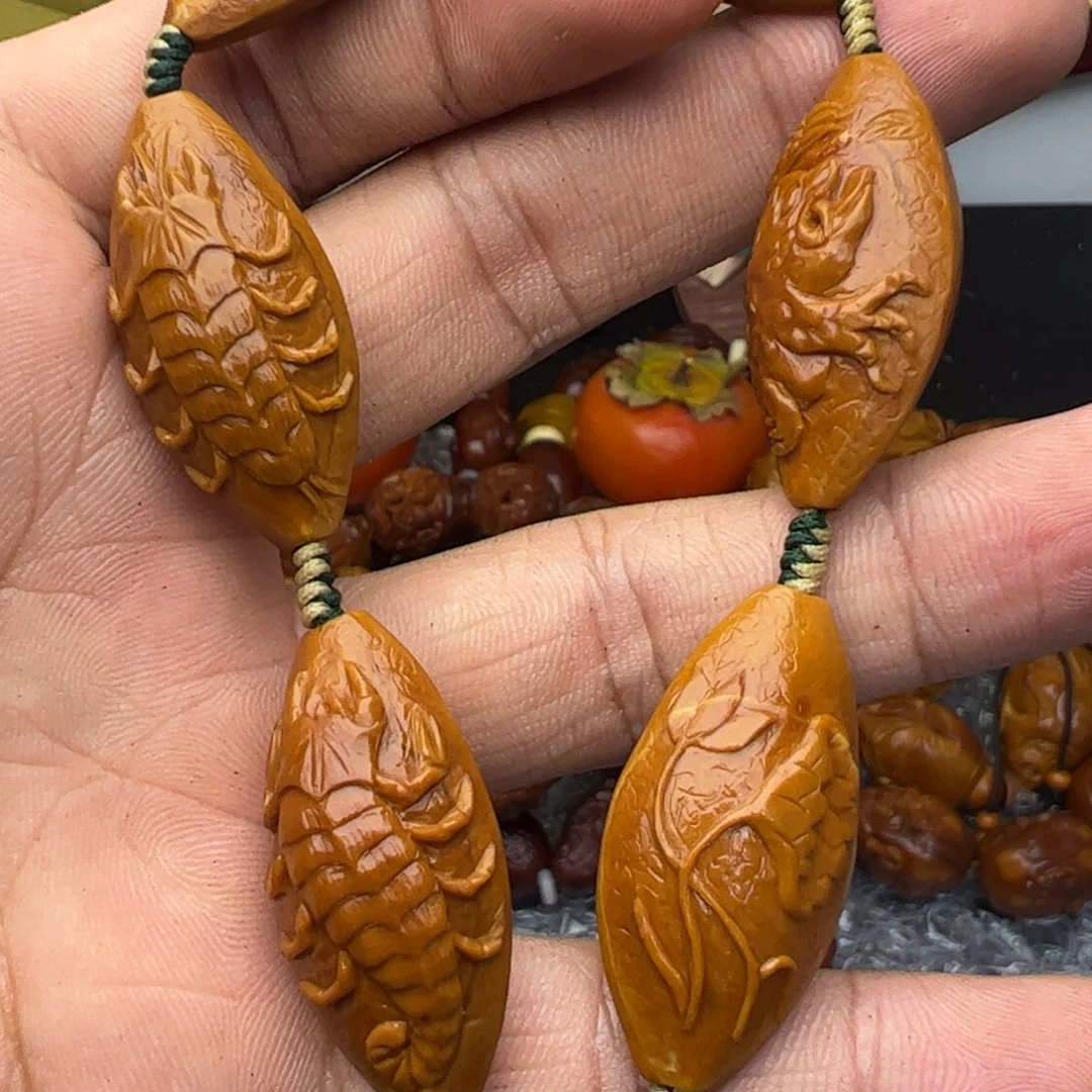 橄榄核核雕两花纯手工五毒