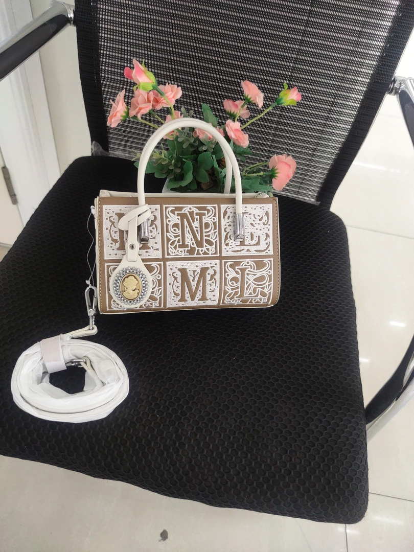 时尚刺绣手提斜挎女士小包包