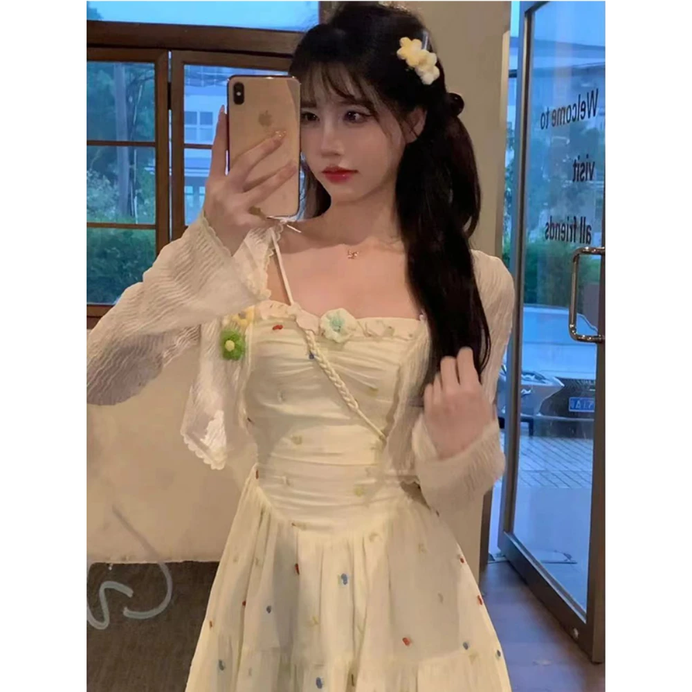 2025夏日来信甜美初恋温柔风显瘦小众设计感碎花中长吊带连衣裙