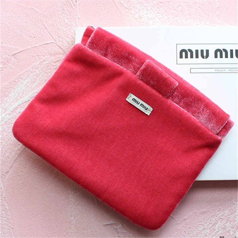 桃粉色丝绒弹簧夹化妆包缪收纳包零钱包手机包整理包