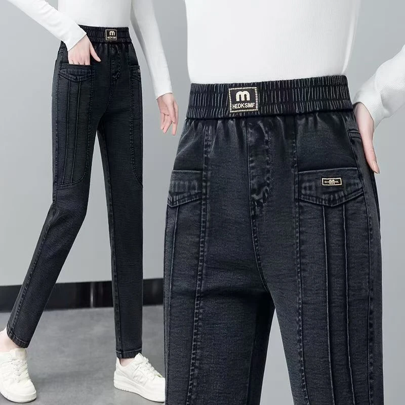 黑灰色高腰显瘦软牛仔裤女2025冬季加绒松紧小脚弹力时尚哈伦裤子