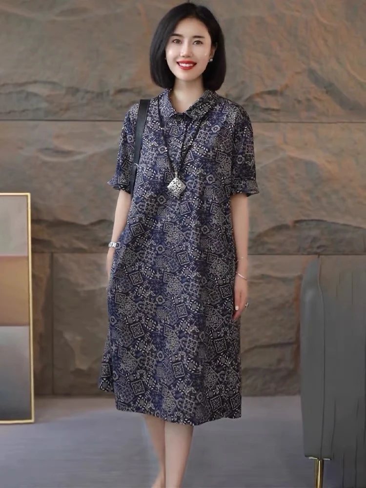 宽松气质翻领印花连衣裙女2025夏季新款蓝色休闲显瘦短袖长裙子女