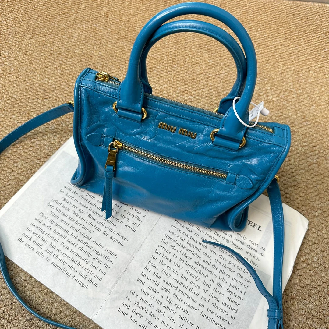 95新 MIU MIU/缪缪  XM/水湖蓝 辣妹手提斜挎机车包/THBI07819005