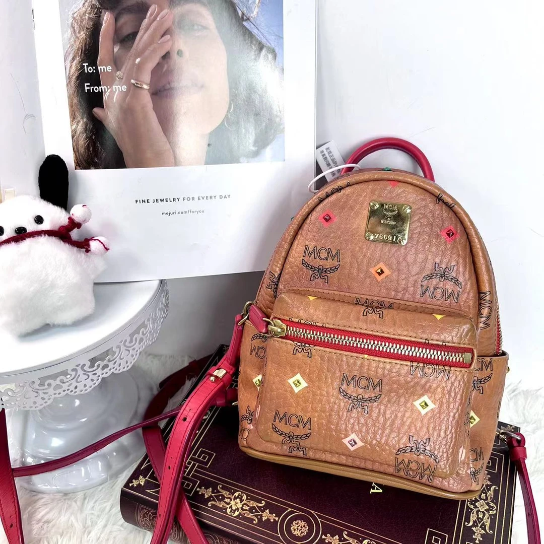 95新 MCM XM/ 经典干邑 彩色铆钉满印超mini双肩包/MM08129191