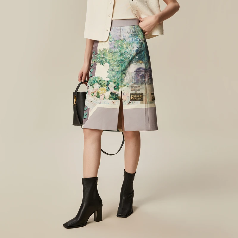 XG雪歌创意花卉印花通勤半身裙春季新款开叉设计碎花中长裙女