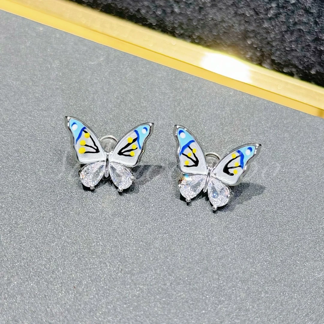 铜合金合成锆石耳饰 【蔚蓝幻翼】蓝白色蝴蝶耳环