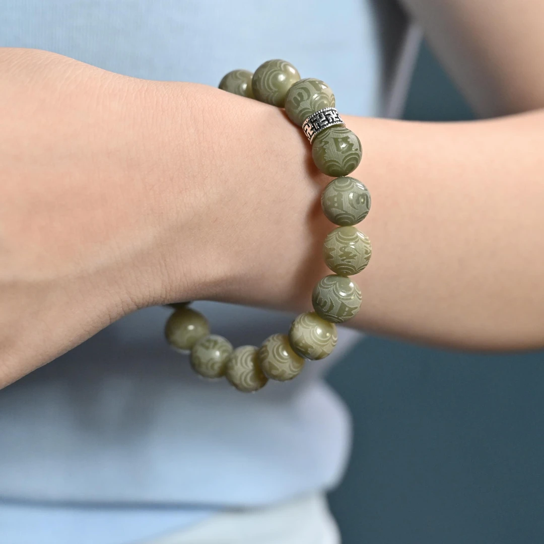 白玉菩提阴皮料六字真言雕刻款藏银配饰单圈设计款手串