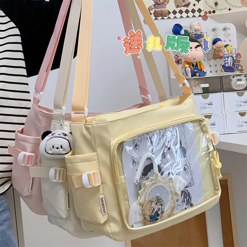 小清新学院风百搭简约大容量邮差包女透明吧唧单肩包斜挎娃包痛包