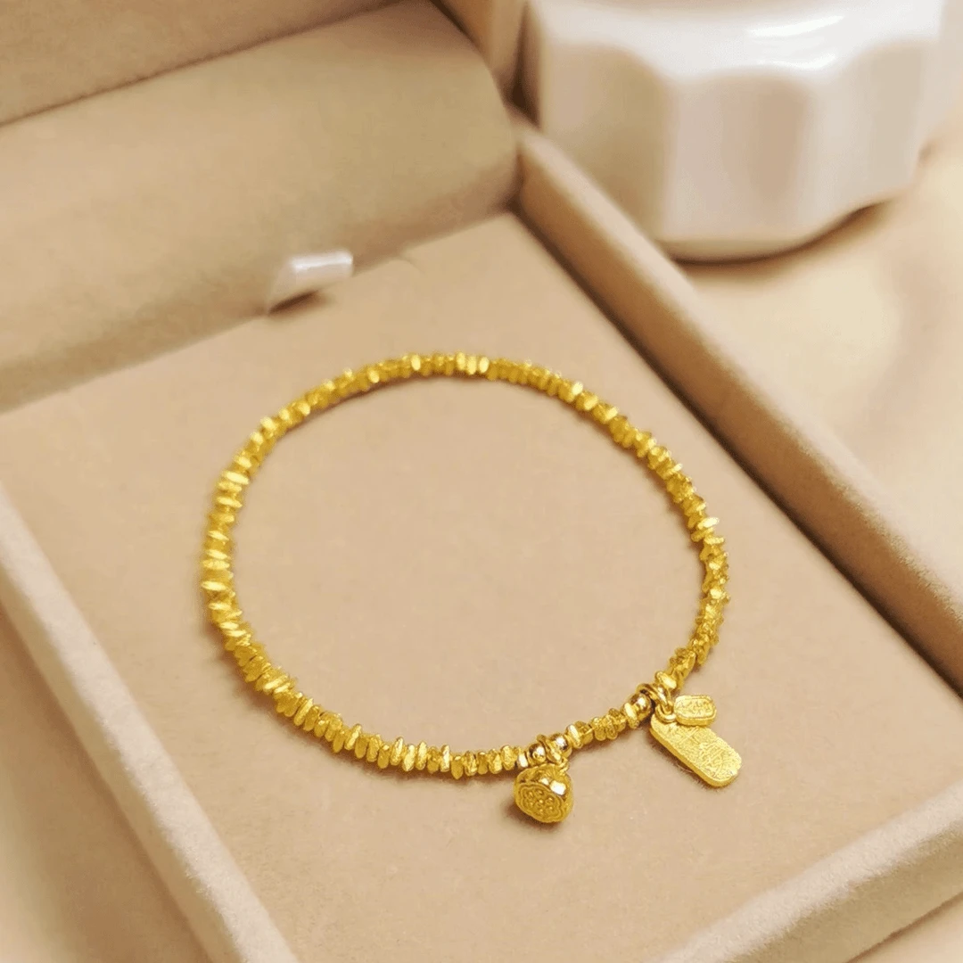 铜合金手链 轻奢碎金色手链福牌莲蓬手串新款气质百搭弹力手串女