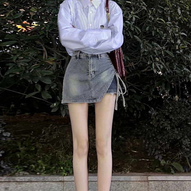辣妹绑带牛仔半身裙裤女夏季新款不规则防走光高腰a字包臀短裙子