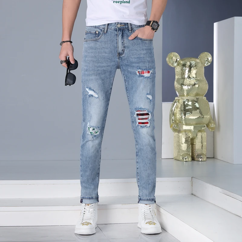 91306新款牛仔裤薄款男潮牌破洞欧货修身户外小脚裤蓝色裤子