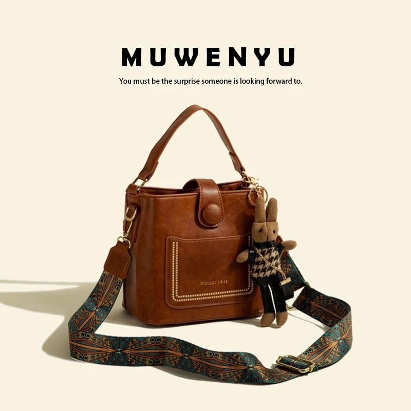 【穆闻雨】复古2024早秋新款高级感单肩斜跨肩包潮流百搭ins水桶包