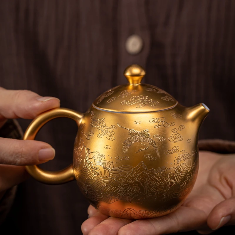 高档鎏金龙凤呈祥茶壶家用泡茶单壶轻奢羊脂玉白瓷创意陶瓷龙蛋壶