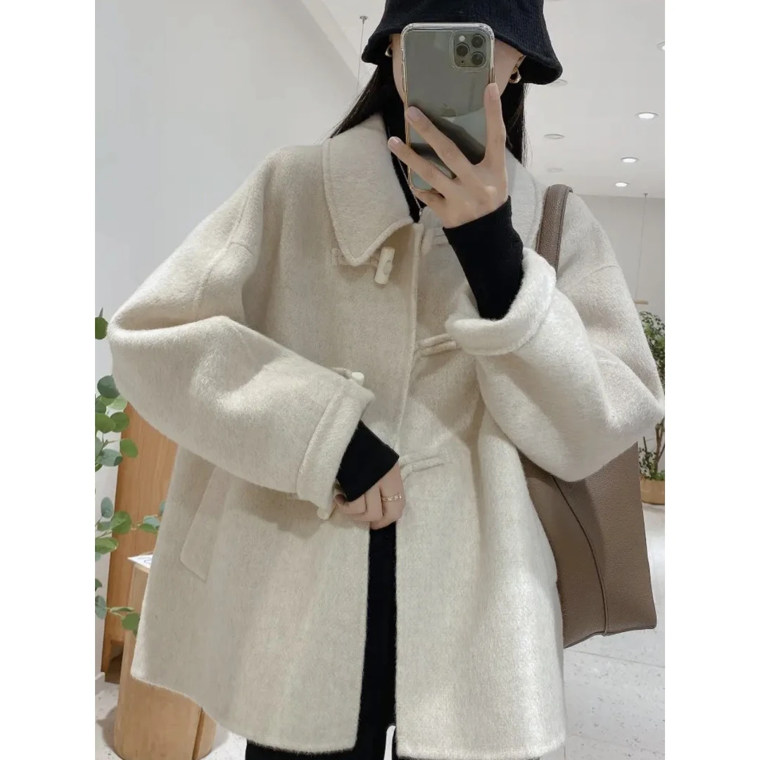 秋冬新款街拍达人翻领牛角扣口袋羊毛外套女韩版简约中长尼上衣厚
