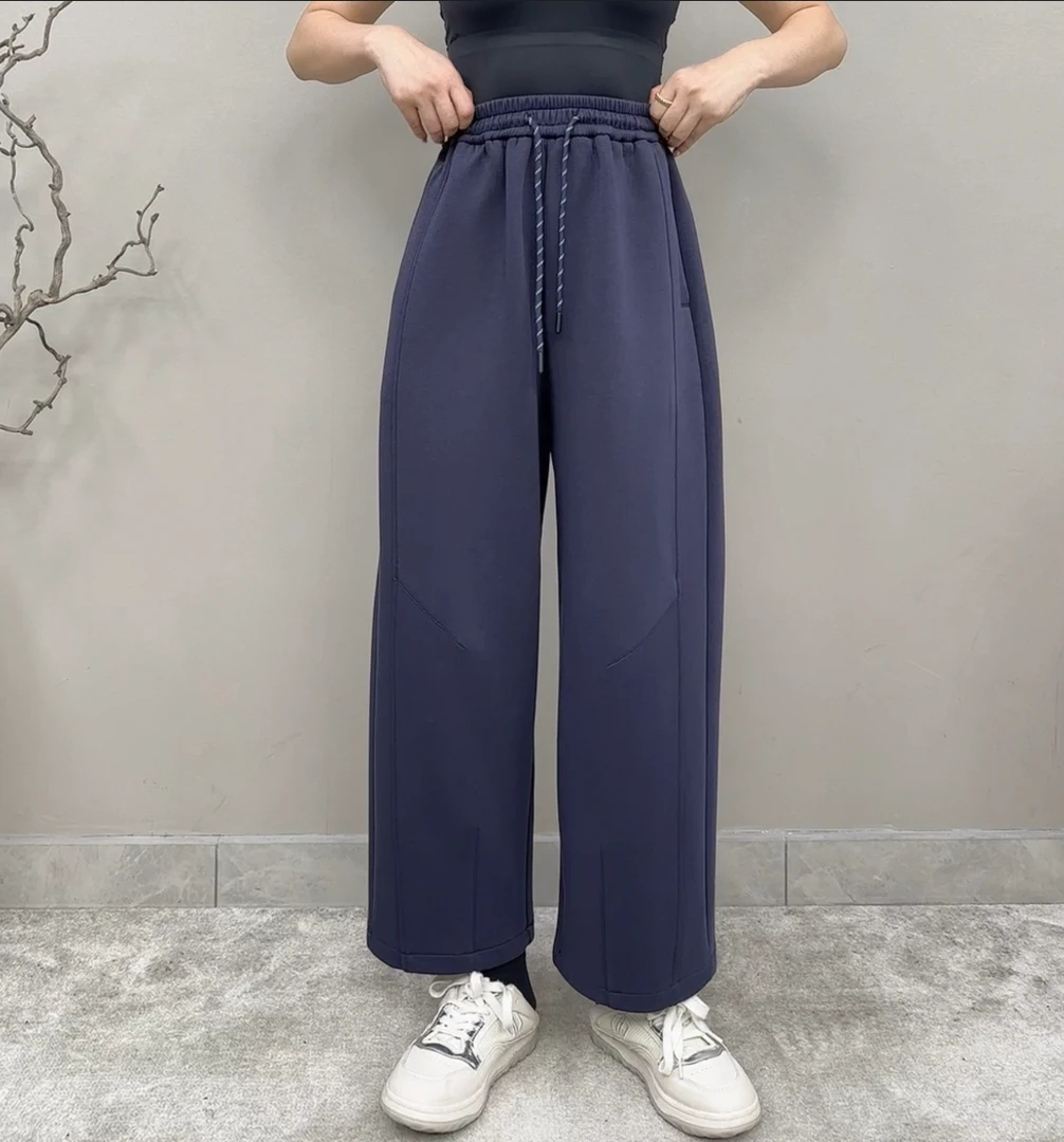 欧版高端简约纯色松紧腰弯刀卫裤