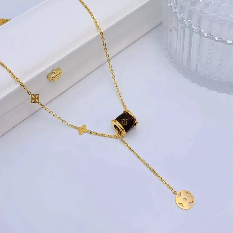 钛钢项链 小蛮腰老花皮圆筒项链四叶草