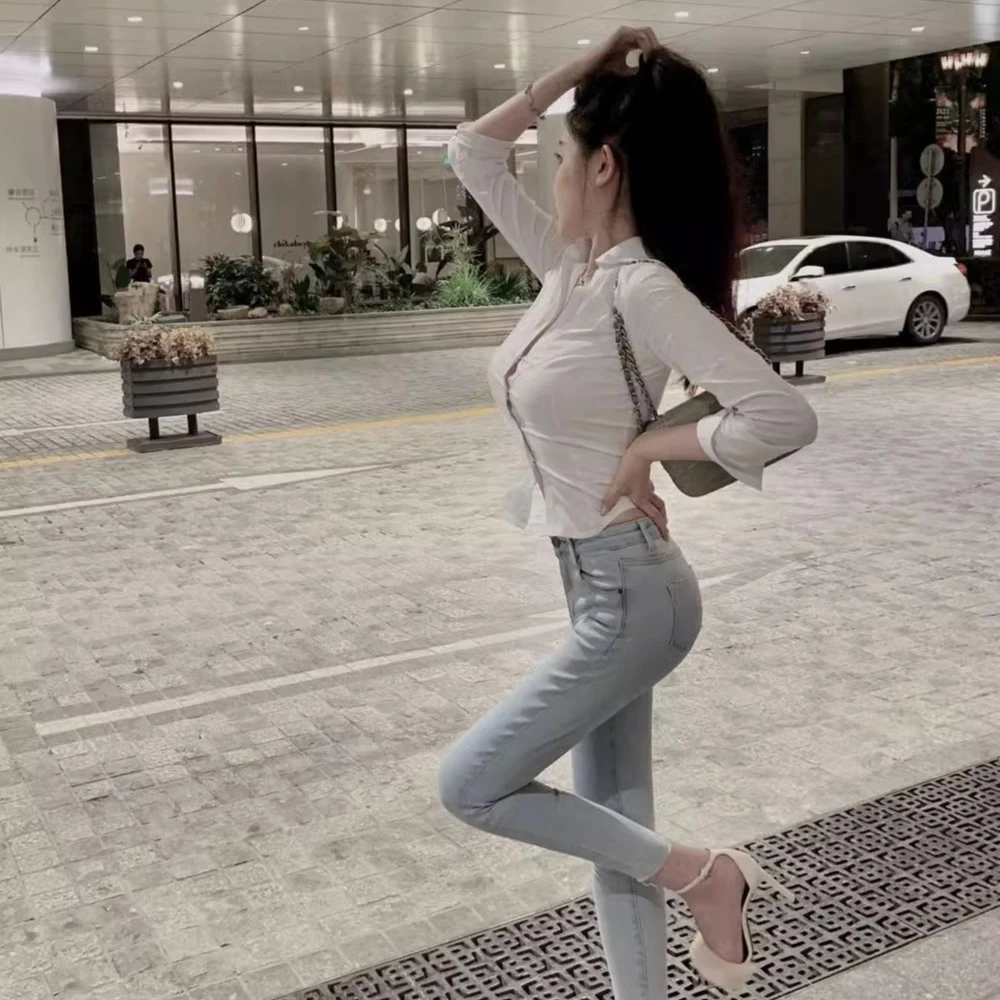 贯妗九分2023新款浅色窄版潮牌显高牛仔裤女新款时尚弹力修身紧身