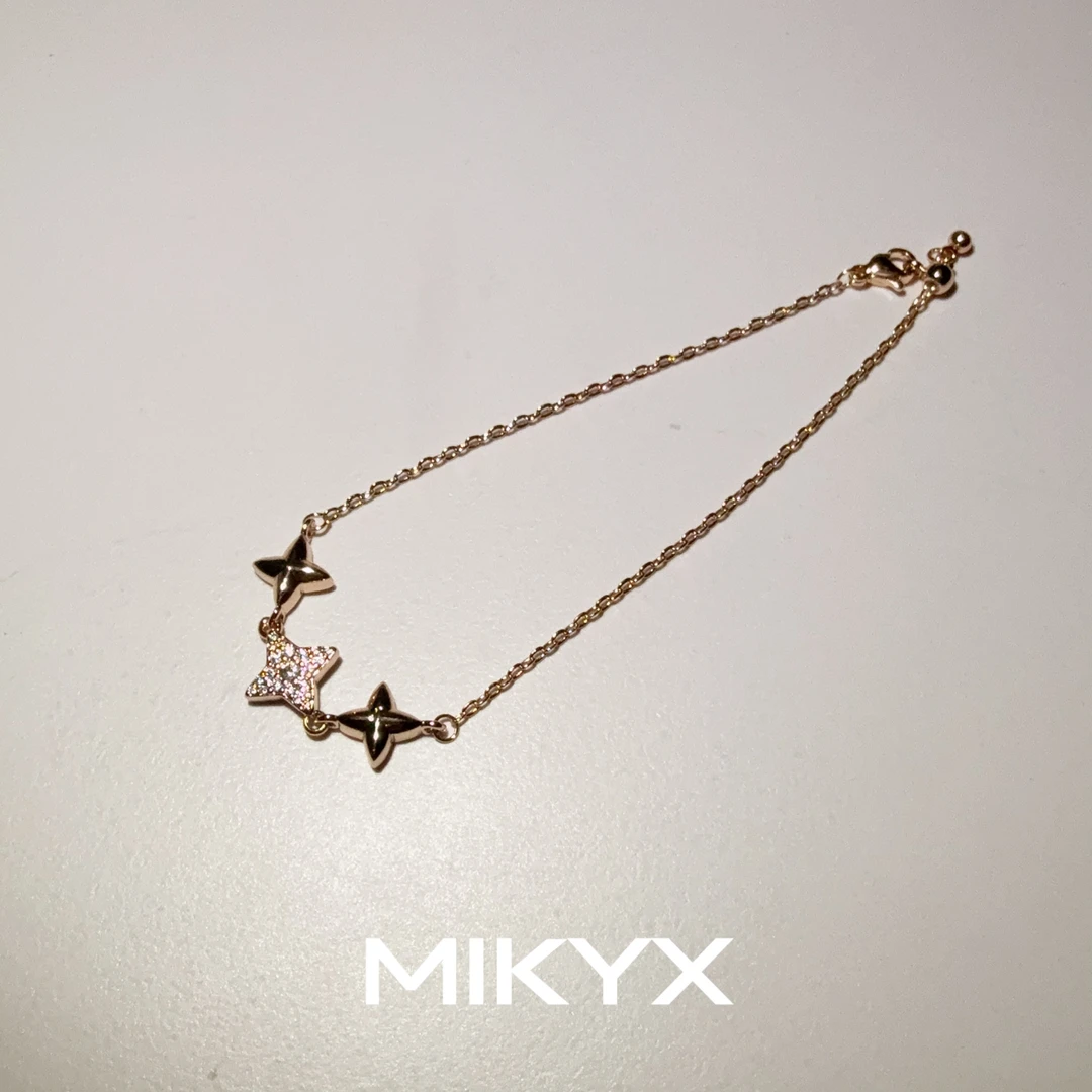 mikyx 铜合金合成锆石手链 玫瑰金色芒星拼接手链B308
