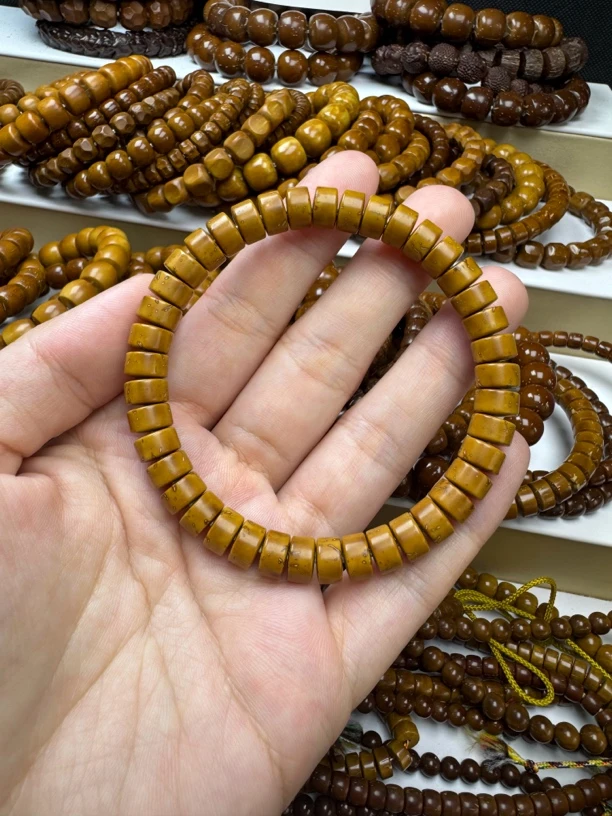 精品紫金鼠黄皮8*5mm纯肉鼠片文玩手串