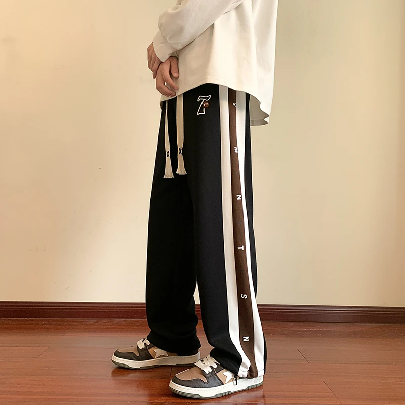 新款加长春秋青少年休闲裤百搭直筒加长宽松束脚抽绳卫裤运动裤