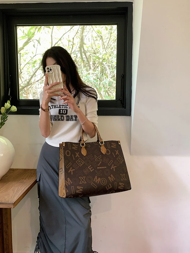 高级感包包女夏2024新款时尚外出手提购物袋大容量通勤百搭托特包