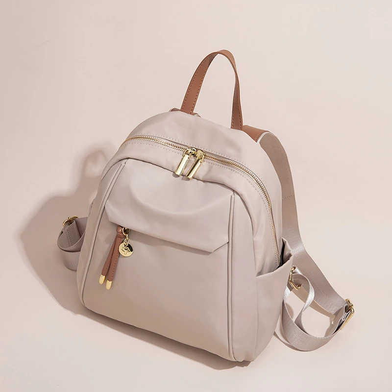 米琦袋鼠高级感轻便简约女士背包2025秋冬新款轻奢时尚双肩包书包