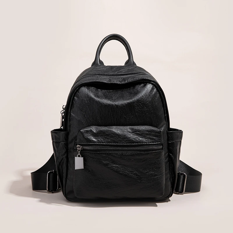 米琦袋鼠韩版高级感洋气简约女士背包2025新款时尚百搭双肩包书包