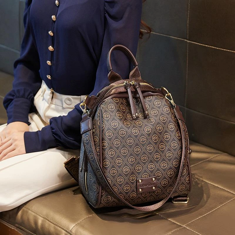 米琦袋鼠韩版时尚印花双肩包百搭旅行女士大气简约背包大学生书包