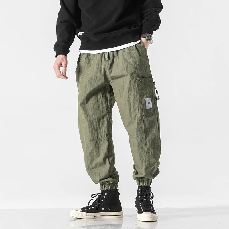 M561潮牌日系简约单侧弹簧扣工装休闲裤