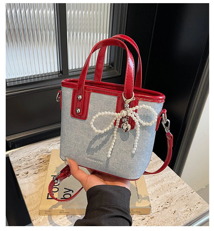 夏天超火小众包包女2024新款流行百搭斜挎包撞色手提水桶包小拎包