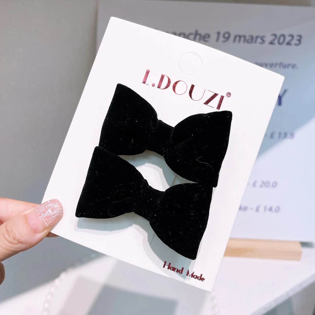 A-5132 ldz 1对黑色蝴蝶结鸭嘴夹 发圈