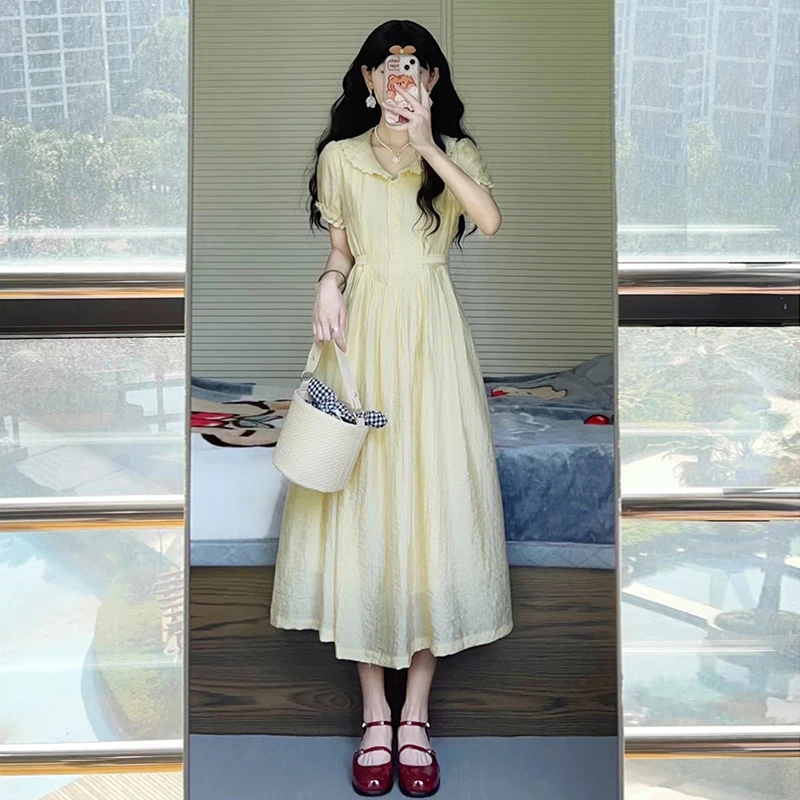 3832娃娃领黄色连衣裙子女夏季法式小众设计高级感小个子长裙